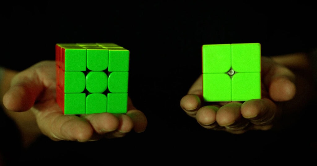 2x2 and 3x3 Rubik’s Cubes representing SEO vs GEO complexity