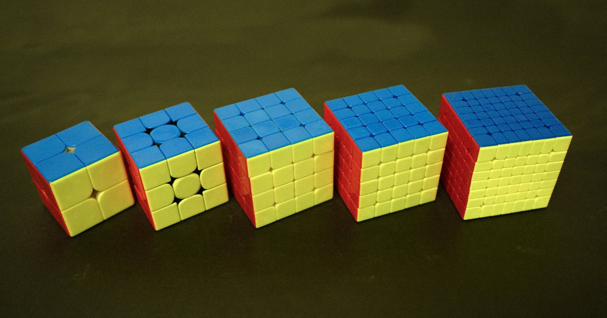 Rubik's Cubes from 2x2 to 7x7 illustrating how GEO will evolve beyond the 3x3